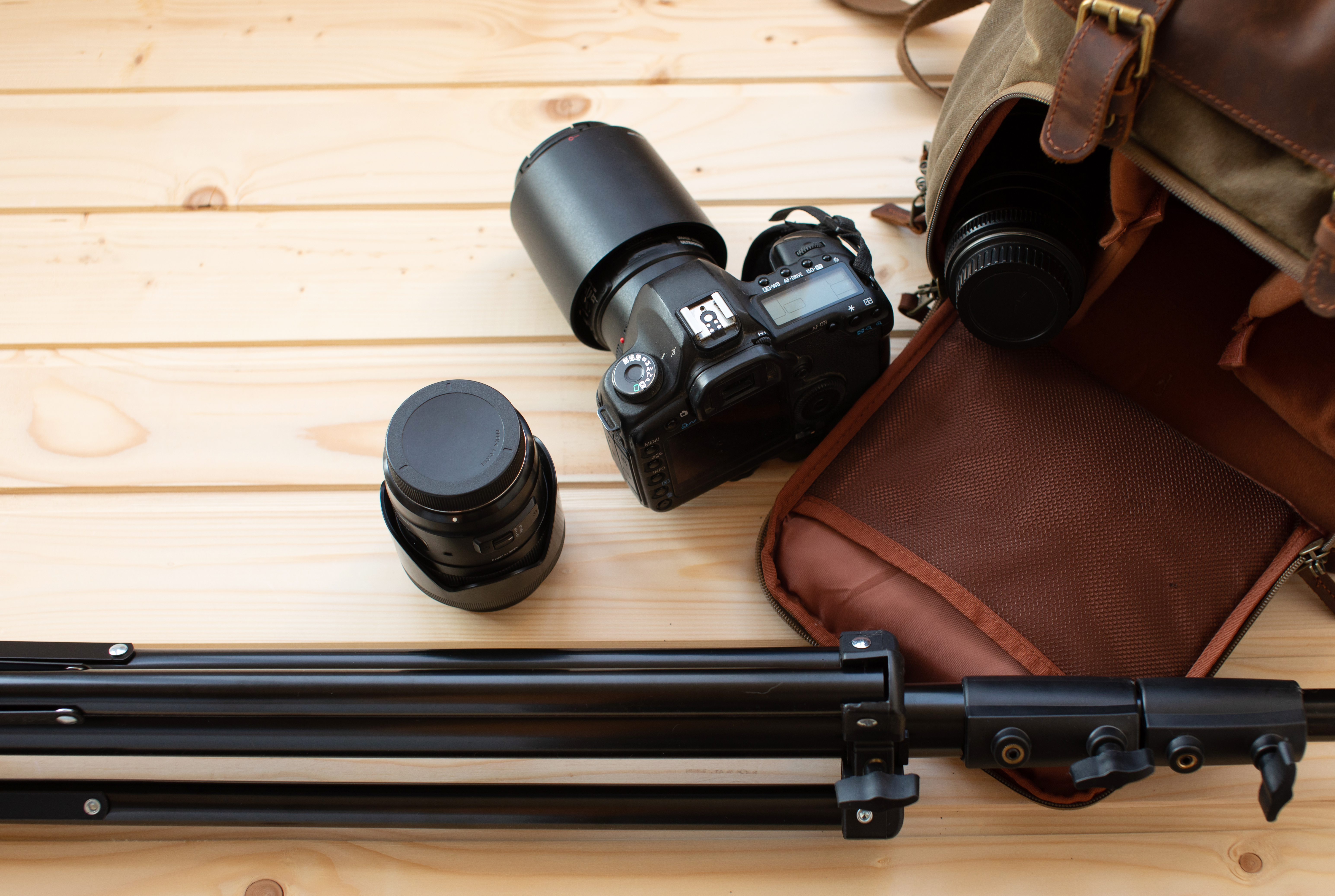 photography gear on a wooden background